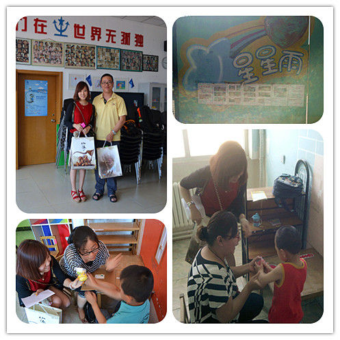 乾游工作人员在与自闭症孩子们互动